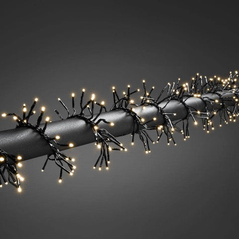 Konstsmide Micro LED Cluster Christmas Lights / Outdoor or Indoor (IP44) / 36V Transformer / 8 Functions, with Memory Control Unit / 1152 Warm White Diodes / Black Cable String Lights