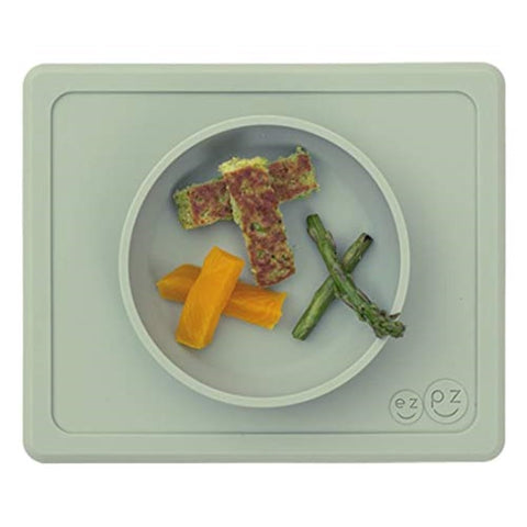 ezpz Mini Bowl (Sage) - 100% Silicone Suction Bowl with Built-in Placemat for Infants + Toddlers - Comes with a Reusable Travel Bag