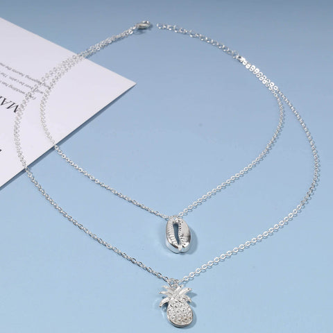 Yheakne Boho Layered Shell Pineapple Choker Necklace Silver Seashell Pendant Necklace Vintage Cowrie Shell Necklace Beach Charm Necklace Jewelry for Women and Girls Gifts