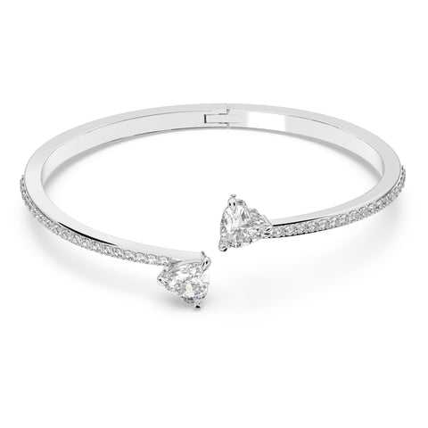 SWAROVSKI Mesmera Bangle Bracelet, Heart-Shaped Clear Crystals on a Rhodium Finish Cuff, Size S, from the Mesmera Collection