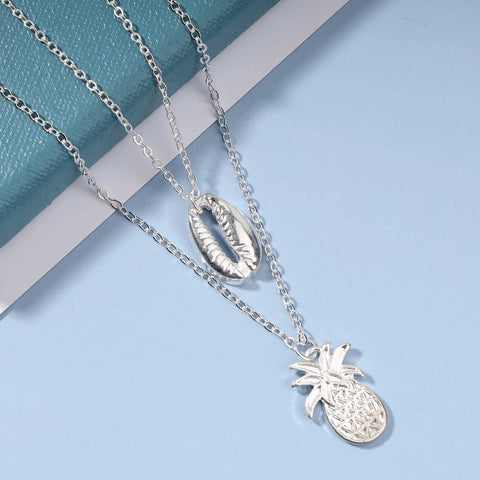 Yheakne Boho Layered Shell Pineapple Choker Necklace Silver Seashell Pendant Necklace Vintage Cowrie Shell Necklace Beach Charm Necklace Jewelry for Women and Girls Gifts