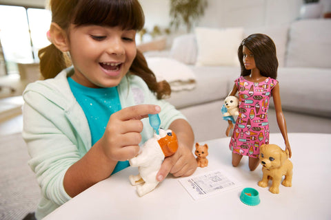 Barbie Doggy Daycare Doll, Brunette, and Pets Playset with Puppy That Poops and One That Pees, Plus Color-Change Paper and More