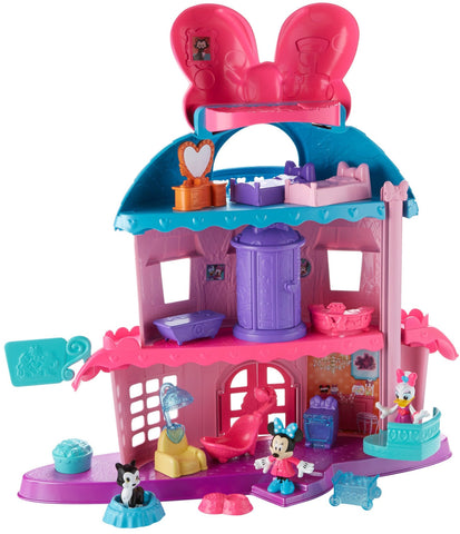 Minnie Mouse's Home Sweet Headquarters is a 4-level dollhouse playset with five rooms of play and features three figures, 12 play pieces, an elevator, and Minnie's magic Turnstyler fashion closet.