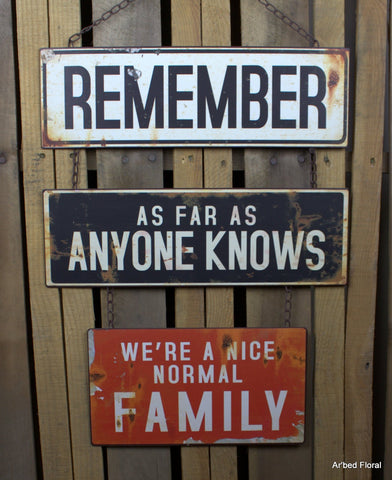 American Mercantile "Normal Family" Metal Sign