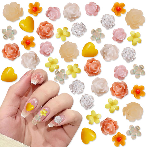 JERCLITY 1 Bag (Approx 100pcs) Flower Nail Charms 3D Flower for Nails Flower Nail Rhinestone for Acrylic Nails Resin Camellia Daisy Rose Five Petal Flowers Nail Studs for Women Nail Art(Orange)