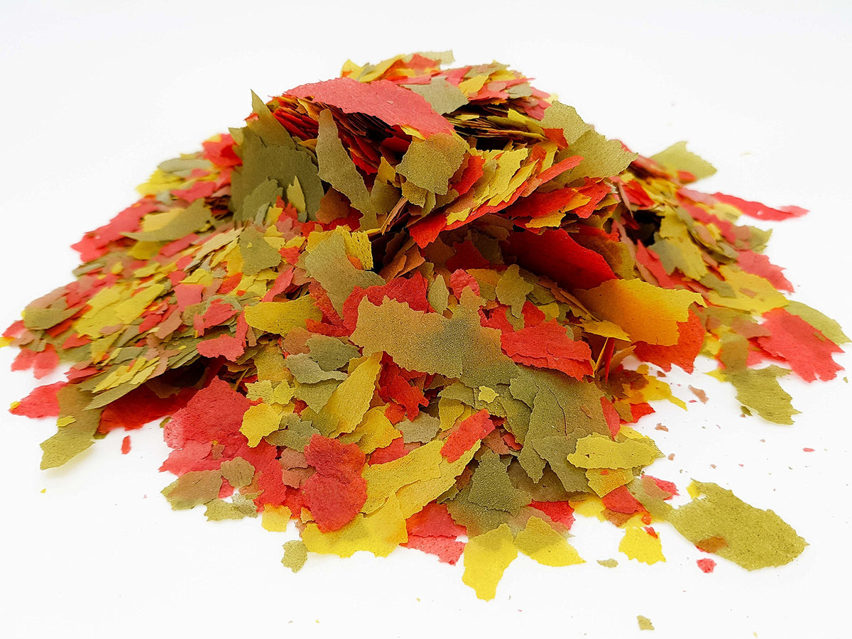 HERONS - Tropical Flakes - For all Tropical Fish - Guppies, Bettas, Neons, Cichlids, Angelfish, Swordtails - Multi-Nutrient Complex - Supports Growth, Colouration and Immune System - 300 Grams