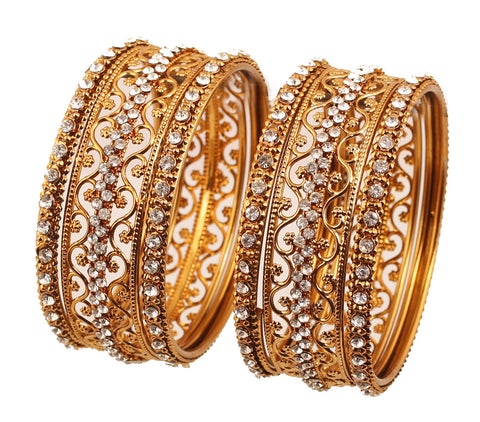 Touchstone "Golden Bangle Collection Exotic Filigree and Grain Work Clear Rhinestone Indian Bollywood Thick Thin Metal Bangle Bracelets in Antique Gold Tone for Women. Set of 6.